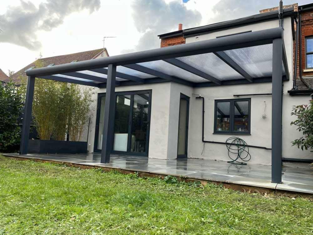 Clear Polycarbonate Veranda On Uneven Wall Space